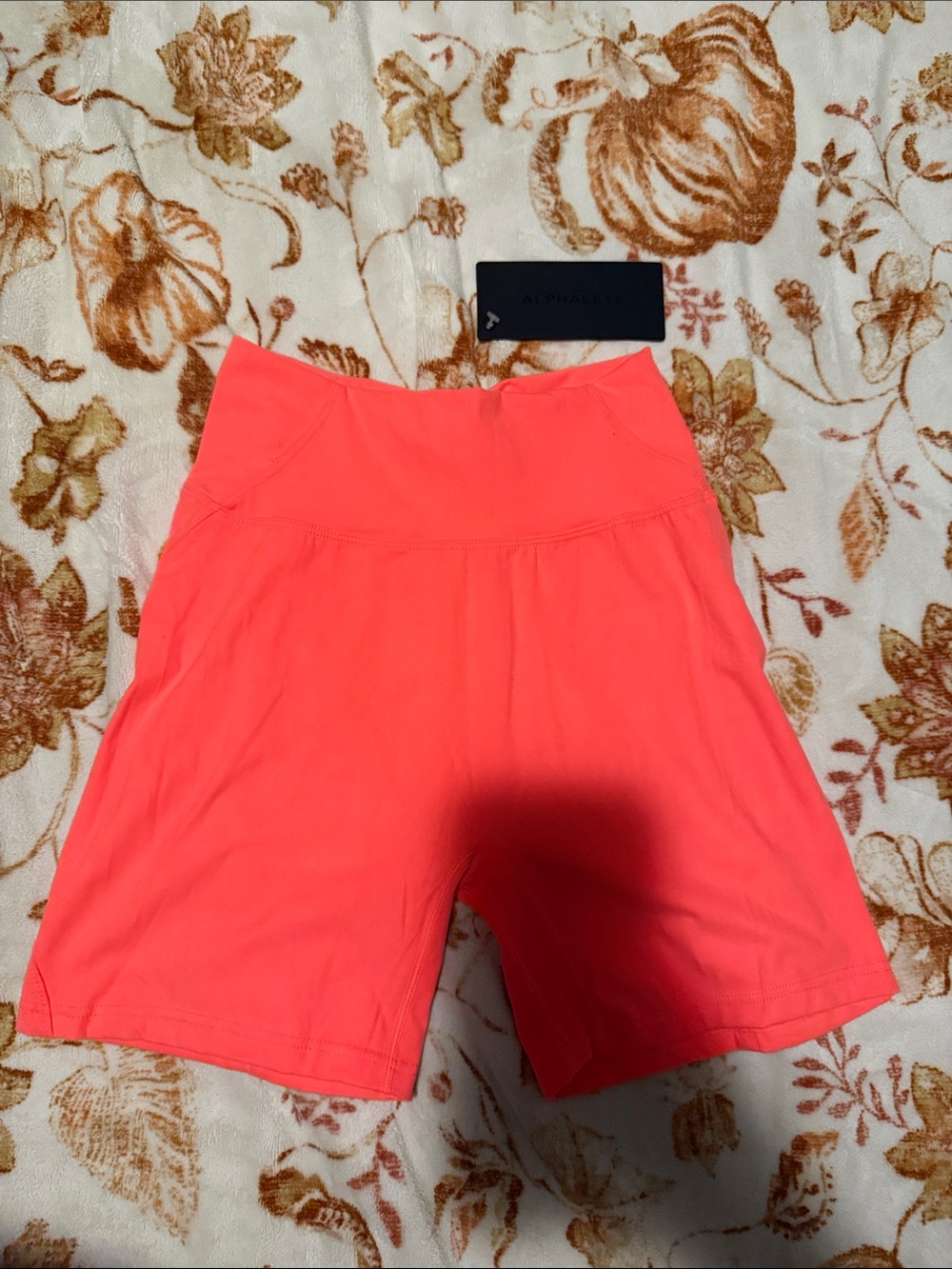 Alphalete Neon Coral High-Rise Bike Shorts